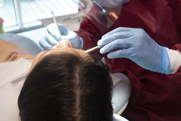tooth filling woman getting a tooth filling