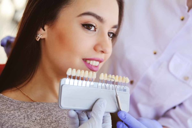 3 Benefits of Dental Veneers woman gets veneers