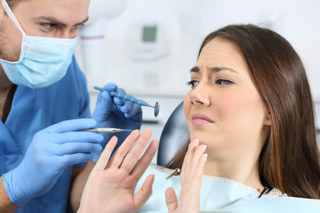 3 Ways to Combat Dental Anxiety woman has dental anxiety
