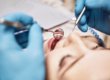 a woman getting dental bridges from her dentist