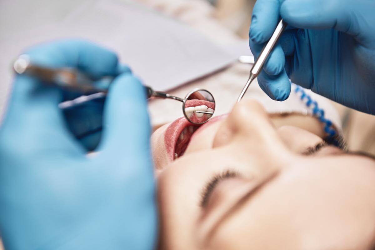 a woman getting dental bridges from her dentist