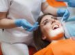 a woman getting a dental filling thinking about what to expect during a dental filling
