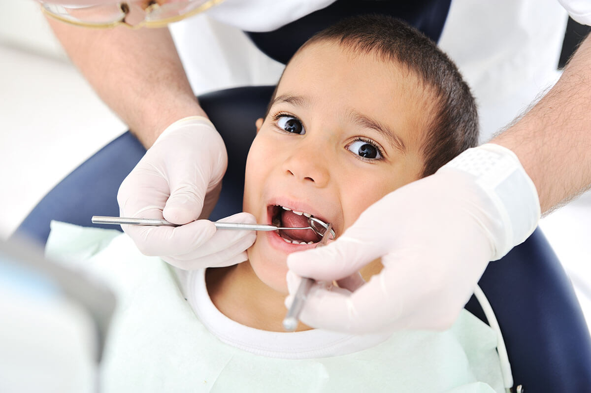 young boy demonstrating dental anxiety in children