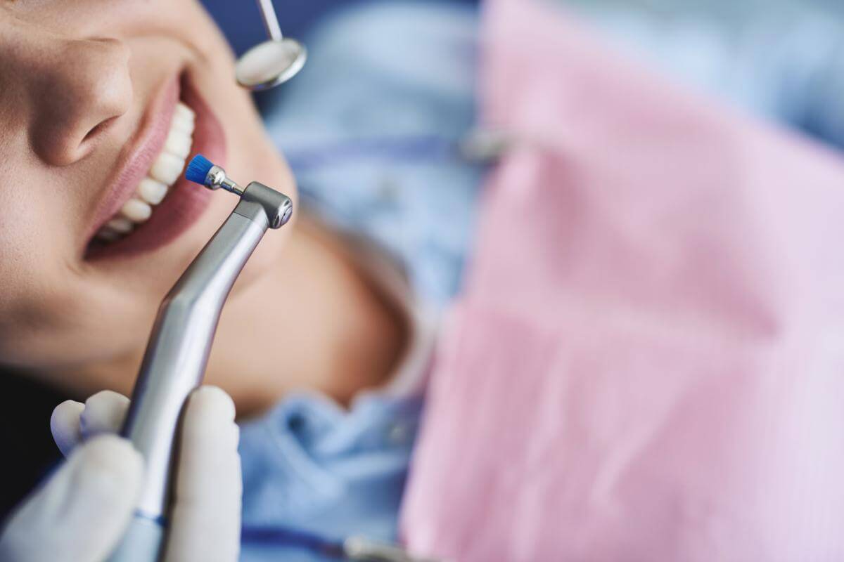 How Often Should You Get a Professional Teeth Cleaning_ woman getting a professional teeth cleaning