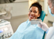 Patient thinking about veneers vs. crowns