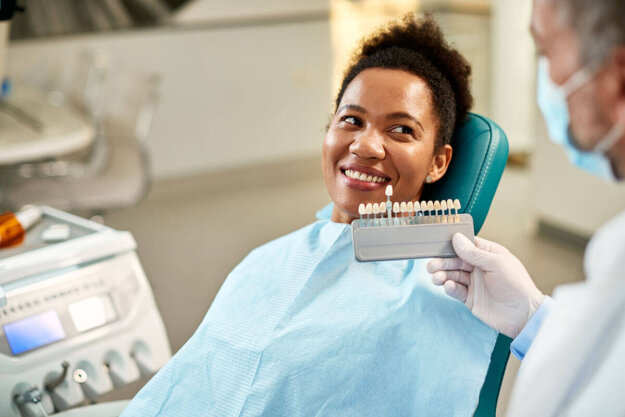 Veneers vs. Crowns Patient thinking about veneers vs. crowns
