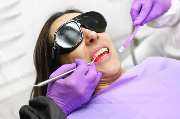 What is Laser Dentistry A woman finding the answer to the question, "What is laser dentistry?"