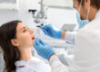 A patient wondering what dental filling cost during a dental visit