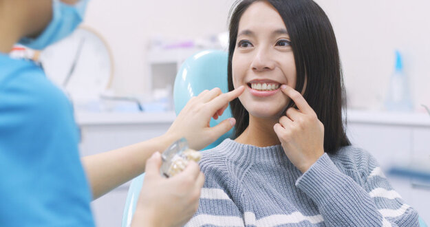 The Importance of Regular Dental Check-Ups Patient realizing the importance of regular dental check ups