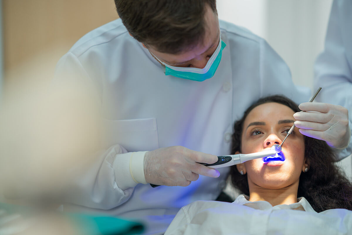 Patient wondering how fluoride helps prevent cavities