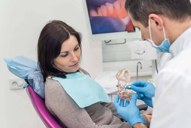 How Long Do Dental Crowns Last A woman asking, "How long do dental crowns last?"