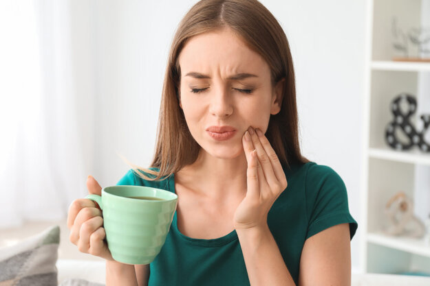 Different-Types-Of-Dental-Trauma A woman experiencing different types of dental trauma