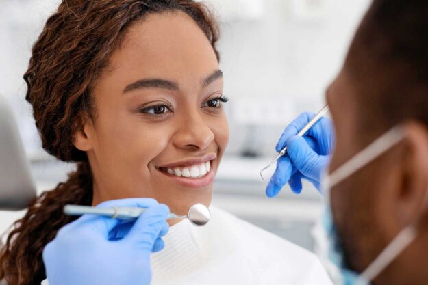A woman visiting her family dentist in Columbia, MD