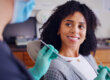 Woman in dentists chair about to get a root canal